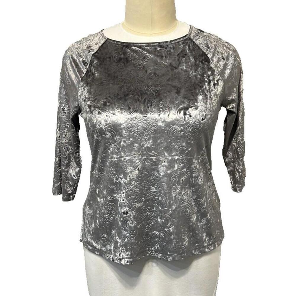 This is a ballet neck three-quarter sleeve fuzzy velour flourish embossed silver